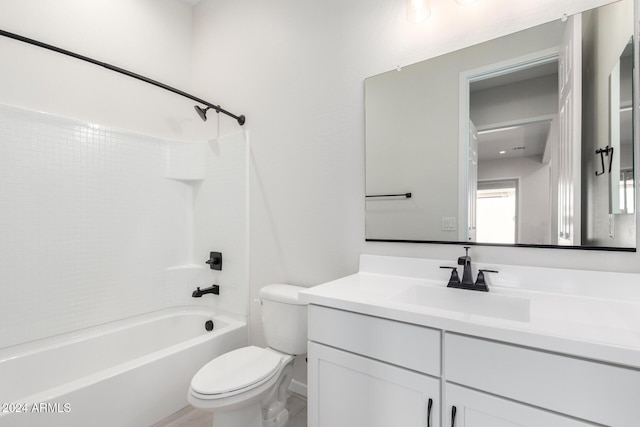 full bathroom with vanity, toilet, and shower / washtub combination