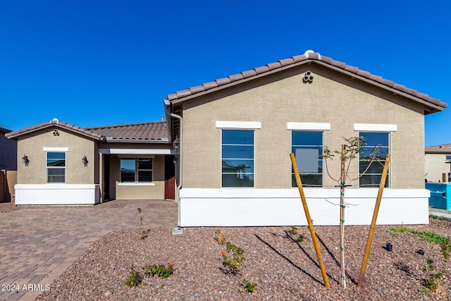 view of front of property featuring a patio area