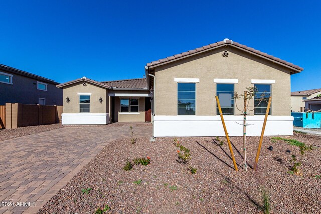 rear view of house with a patio area