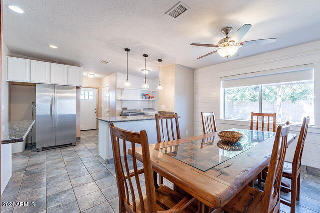 dining area featuring ceiling fan