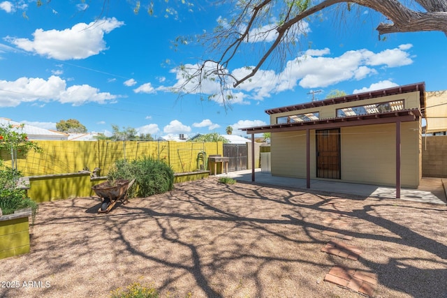 view of patio / terrace featuring an outbuilding