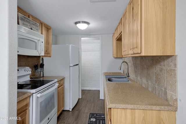 kitchen with white appliances, light brown cabinets, decorative backsplash, sink, and dark hardwood / wood-style floors