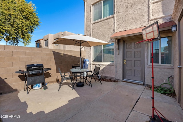 view of patio with area for grilling