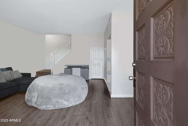 living room featuring dark wood-type flooring