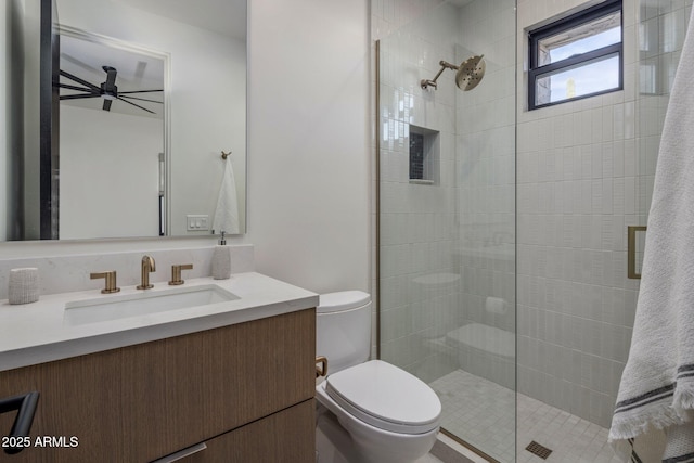 24863 N 103rd Way, Scottsdale, AZ 85255 - bathroom with toilet, tiled shower, vanity, and a ceiling fan