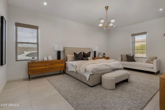 24863 N 103rd Way, Scottsdale, AZ 85255 - bedroom featuring a chandelier, light tile patterned flooring, and baseboards