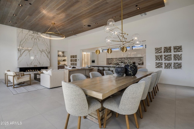 24863 N 103rd Way, Scottsdale, AZ 85255 - dining room featuring wood ceiling, light tile patterned floors, and a chandelier