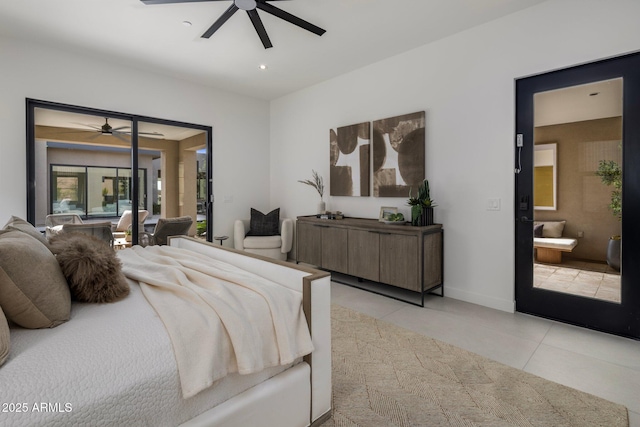 24863 N 103rd Way, Scottsdale, AZ 85255 - bedroom with light tile patterned floors, access to outside, connected bathroom, ceiling fan, and baseboards