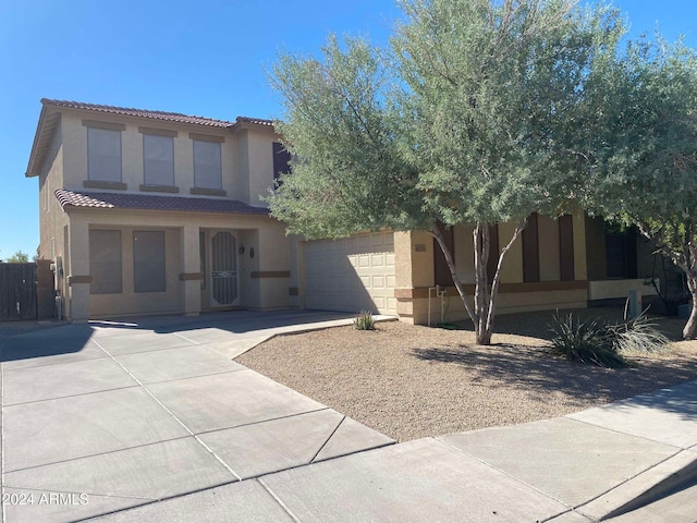 view of front of home with a garage