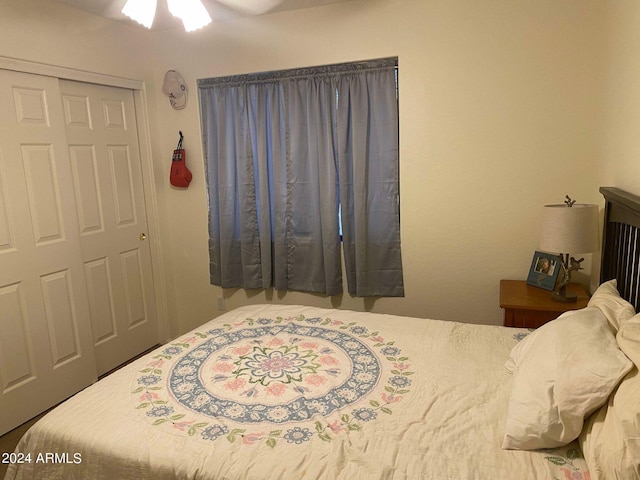 bedroom featuring a closet and ceiling fan