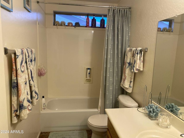 full bathroom featuring vanity, toilet, and shower / tub combo