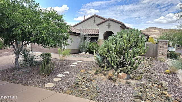3002 W Caravaggio Ln, Phoenix, AZ 85086 - view of front of house with a tile roof, stucco siding, and an attached garage