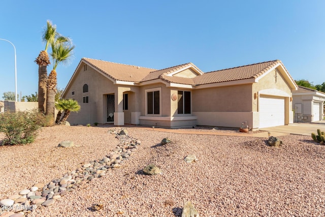 view of front of home with a garage