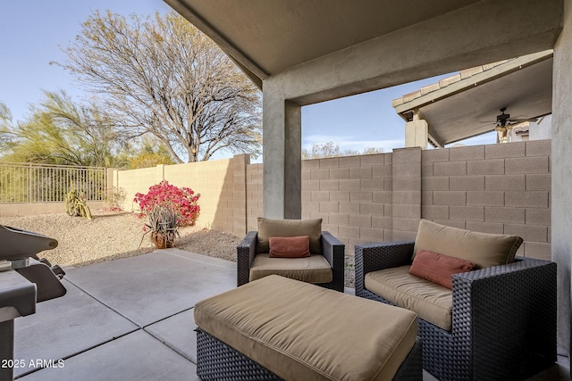 view of patio featuring ceiling fan