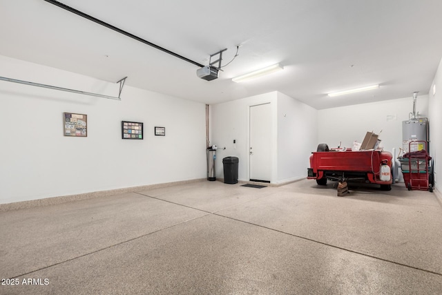 garage with a garage door opener and water heater