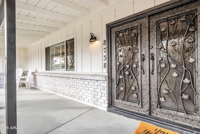 entrance to property with covered porch