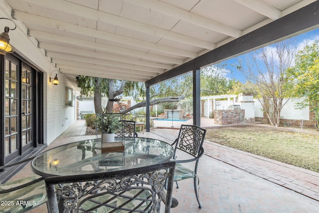 view of patio with a pool