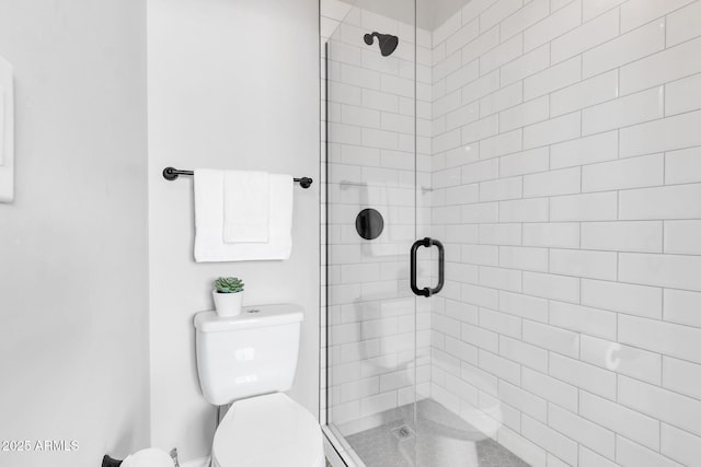 bathroom featuring walk in shower and toilet