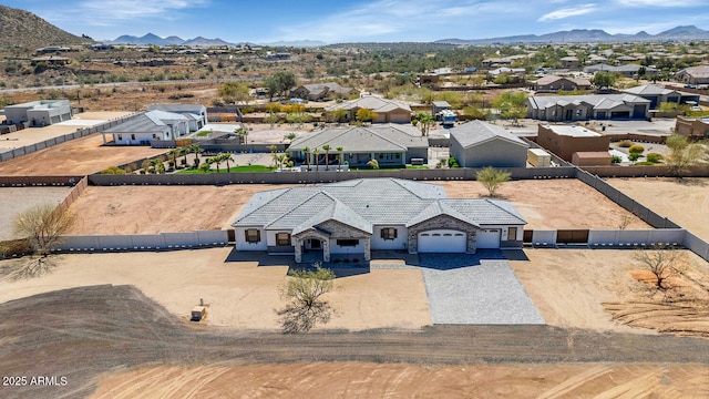 bird's eye view with a mountain view and a residential view