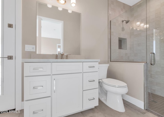 full bath with tile patterned flooring, a shower stall, toilet, and vanity