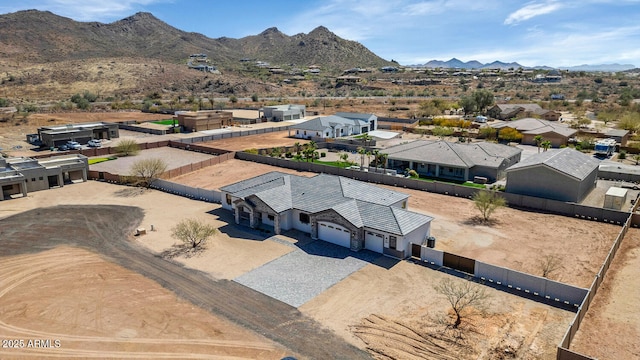 bird's eye view featuring a mountain view and a residential view