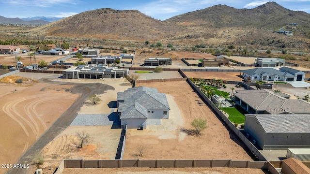 aerial view with a mountain view and a residential view