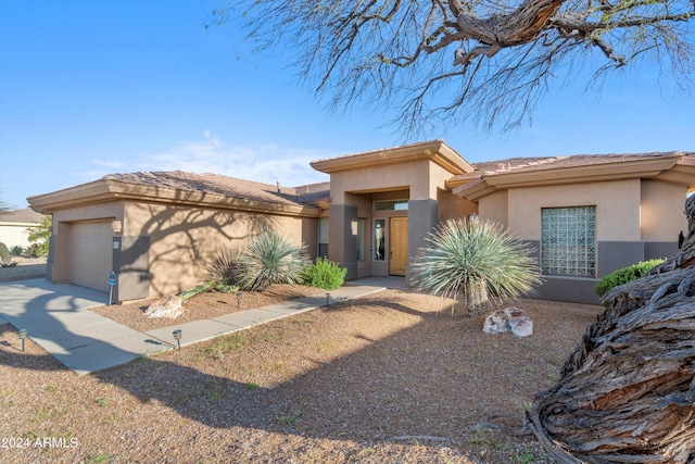 view of front of home with a garage