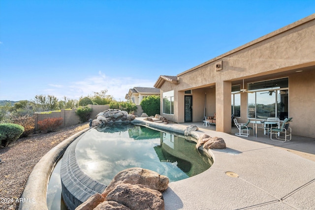 view of pool featuring a patio