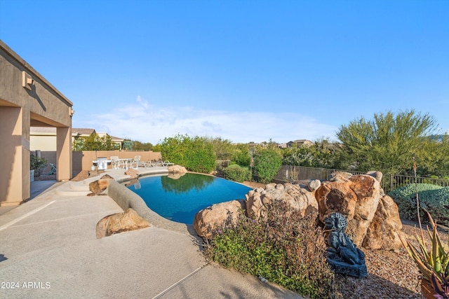 view of pool featuring a patio