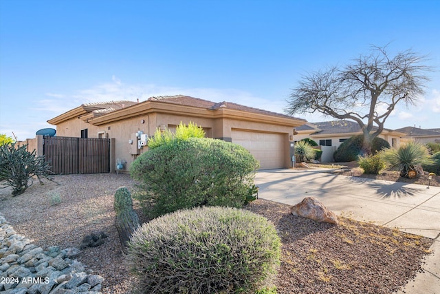 view of front of property with a garage