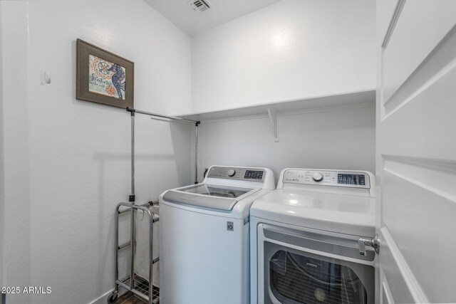 9757 E Red Giant Dr, Mesa, AZ 85212 - laundry room featuring washer and dryer