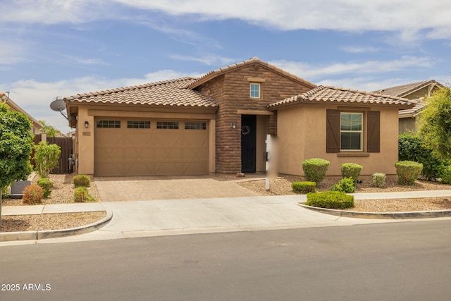 9757 E Red Giant Dr, Mesa, AZ 85212 - view of front of house with a tiled roof, stucco siding, driveway, and an attached garage