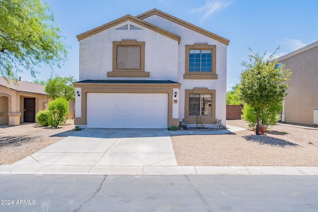 view of front of property featuring a garage