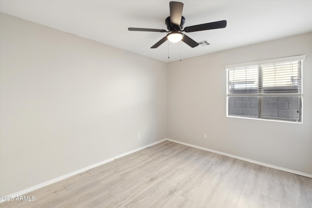 unfurnished room with ceiling fan and light hardwood / wood-style flooring