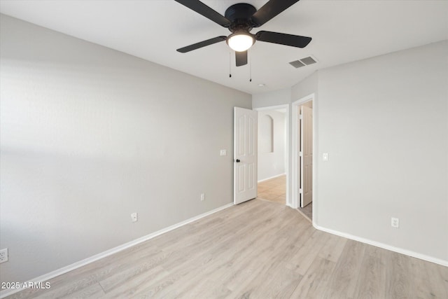 unfurnished bedroom featuring ceiling fan and light hardwood / wood-style floors