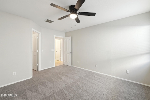 unfurnished bedroom with light carpet and ceiling fan