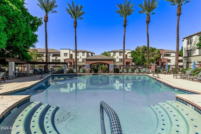 view of pool with a gazebo and a patio area