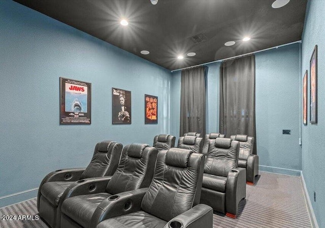 cinema room with carpet flooring