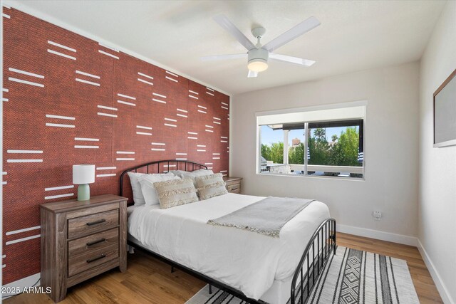 6271 E Evans Dr, Scottsdale, AZ 85254 - bedroom featuring wood finished floors, ceiling fan, and baseboards