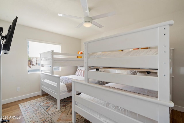 6271 E Evans Dr, Scottsdale, AZ 85254 - bedroom featuring baseboards, a ceiling fan, and wood finished floors