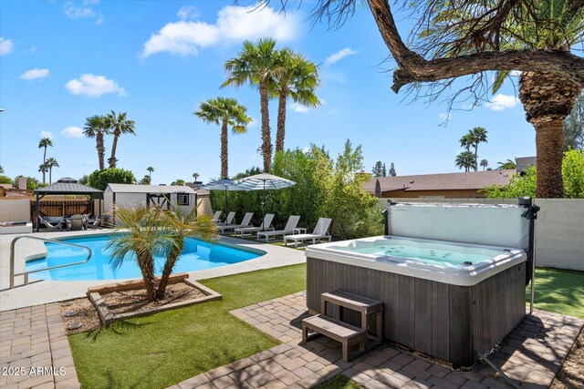 6271 E Evans Dr, Scottsdale, AZ 85254 - view of pool with a hot tub, a patio area, a gazebo, a fenced backyard, and an outdoor structure