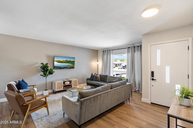 6271 E Evans Dr, Scottsdale, AZ 85254 - living room with light wood-style floors and baseboards