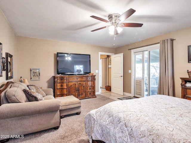 bedroom featuring light carpet, access to outside, and ceiling fan