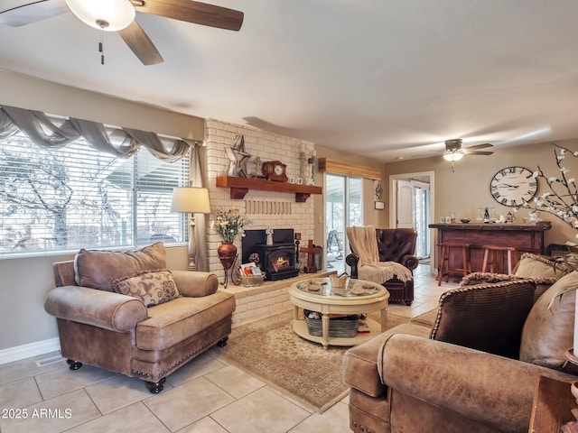 living room featuring a healthy amount of sunlight and light tile patterned floors