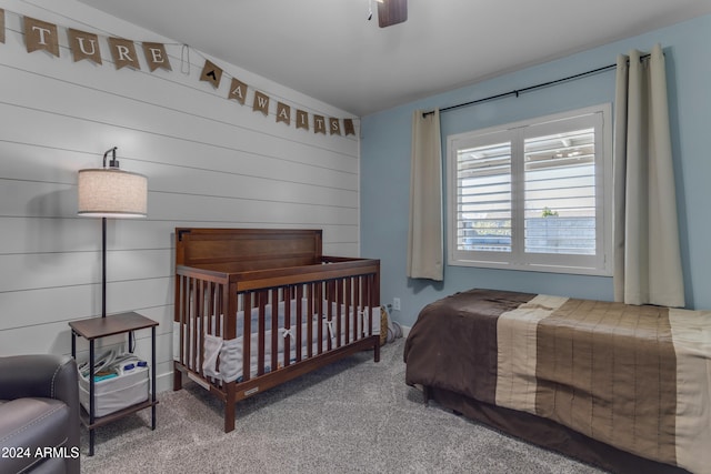 bedroom with ceiling fan and carpet flooring