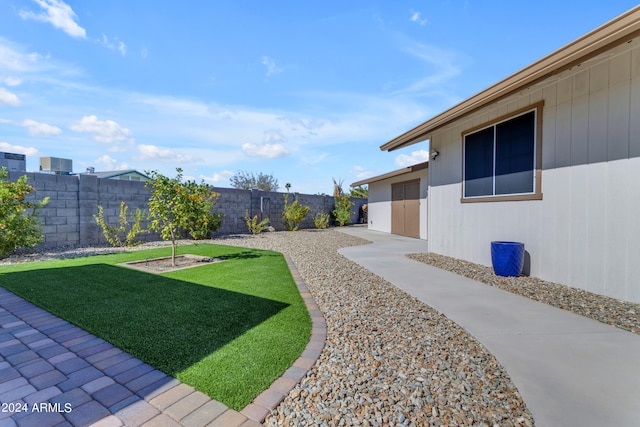 view of yard featuring a fenced backyard