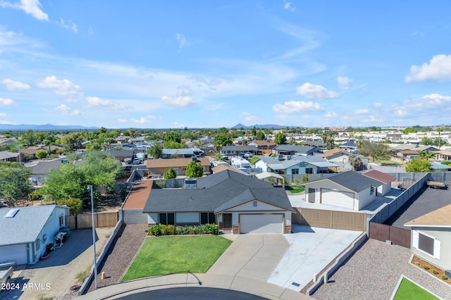 birds eye view of property with a residential view