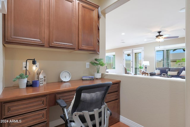 office space with ceiling fan, recessed lighting, built in desk, and a wealth of natural light
