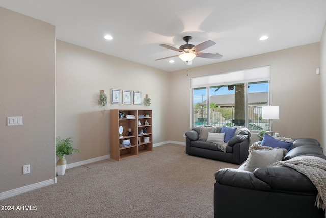living area featuring baseboards, ceiling fan, carpet flooring, and recessed lighting