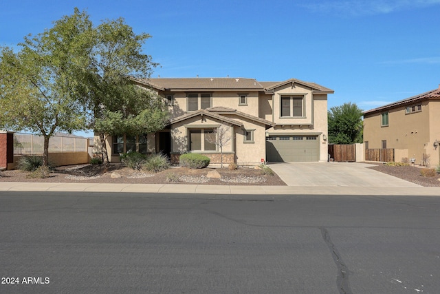 view of front of property featuring a garage